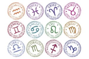 Símbolos dos signos coloridos estão sob fundo branco